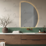 آینه‌ها نقش مهمی در دکوراسیون سرویس بهداشتی و حمام دارند و انتخاب محصولی مناسب می‌تواند جلوه محیط را به‌طور چشمگیری تغییر دهد. آینه دفرمه روشویی Code : AB21 با طراحی مدرن و امکانات هوشمند، تجربه‌ای لوکس و کاربردی ارائه می‌دهد. فرم دفرمه و سبک اردکانه این مدل باعث می‌شود محیط شما جلوه‌ای متفاوت و شیک پیدا کند و استفاده از حمام را دلنشین‌تر نماید.